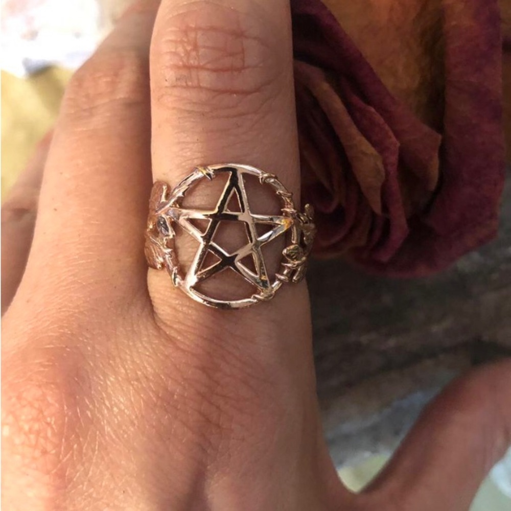 Pamela Love Pentagram Ring- pentagram is framed by etched leaves.